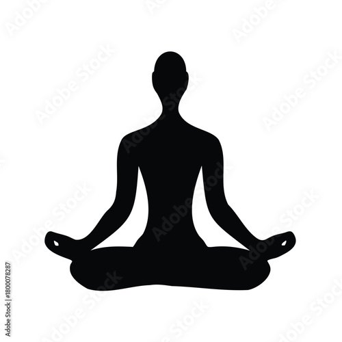 Silhouette of person meditating in lotus position for relaxation and calmness