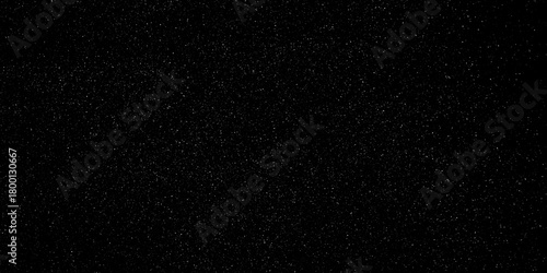 Snow particle overlay featuring minuscule white flakes scattered across a solid dark black background