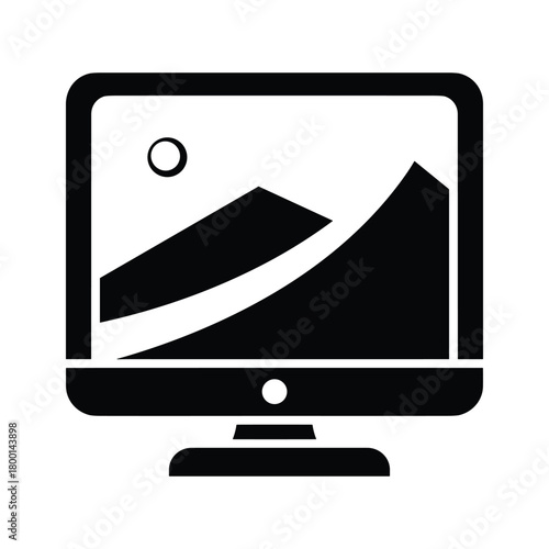 Computer monitor displaying a landscape image isolated on