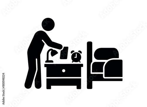 person tidying bedside items flat black solid vector illustration isolated on white background