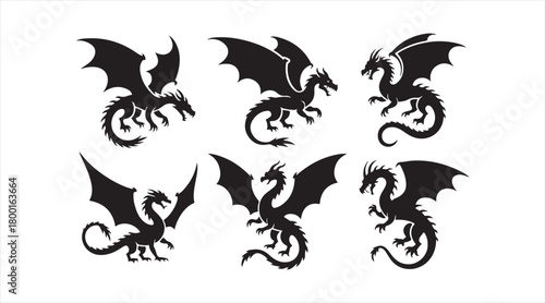 Black dragon shapes with wings and serpentine bodies isolated for graphic design