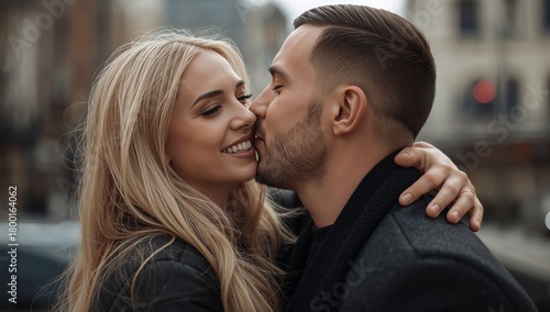 Couple Sharing a Joyful Moment in a City Street During a Rainy Afternoon