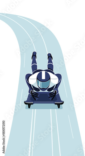 Skeletoneer speeding downhill on ice track during winter games race