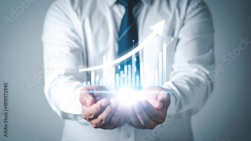 Businessman Holding Holographic Graph - Visualizing Success and Growth.