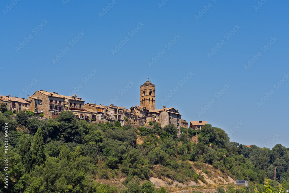 Fototapeta premium Medieval Ainsa village church tower and houses