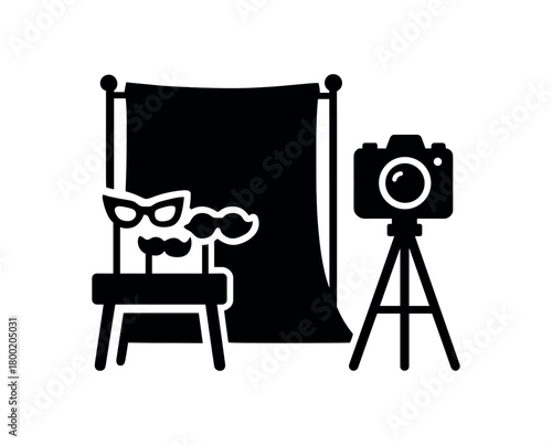 flat black vector illustration of photo booth corner with props camera and backdrop bold silhouette shapes isolated on white background