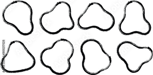 Collection of eight irregular organic blob shapes with rough textured outlines on a white background