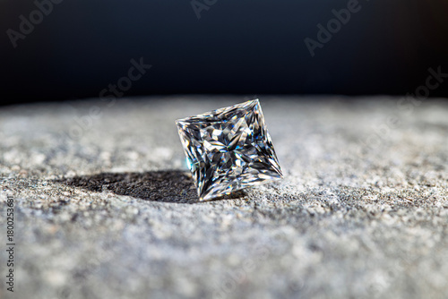 A diamond is sitting on a rock