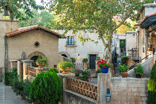 A view of the Catholic Chapel at the Mexican-style Tlaquepaque Arts Village in Sedona, Arizona, with decorative walls and a courtyard with shops and galleries, USA.