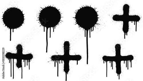 Collection of black spray paint drip symbols including crosses and ovals