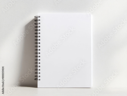 Blank White Spiral Notebook Vertical Mockup