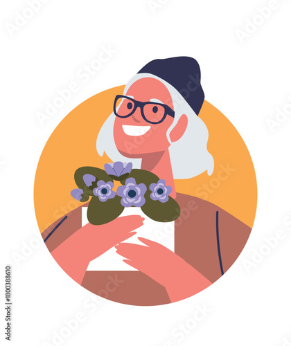 Happy senior woman with flower