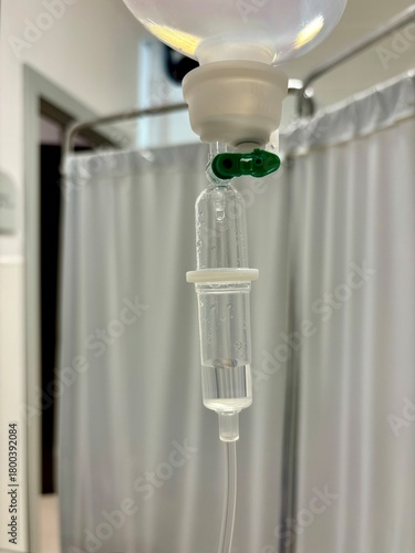 The medicine in the drip or drop counter on the hospital background 