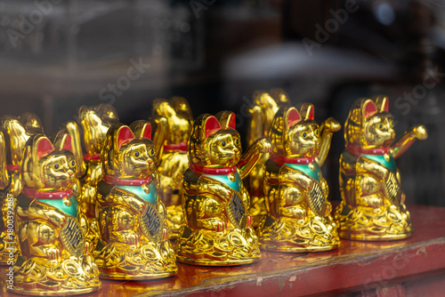 Good luck maneki-neko Japanese good luck gold cats in window