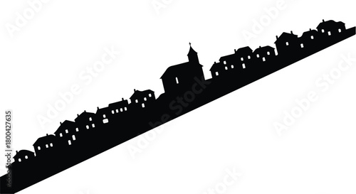 Silhouette of a charming village with a church on a gentle slope