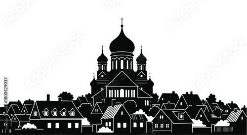 Majestic church silhouette towering over a charming village at dusk.