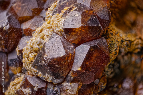 Garnet Crystals from Dalnegorsk, Russia. Red-Brown Faceted Structure, Macro Photography of Natural Mineral, Surface Textures, Collector’s Specimen