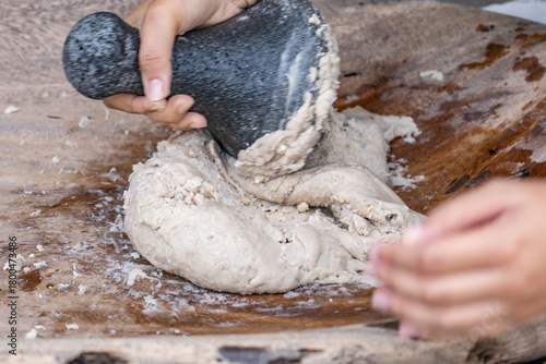 Photography Poi or popoi is a traditional staple food in the Polynesian diet, made from taro