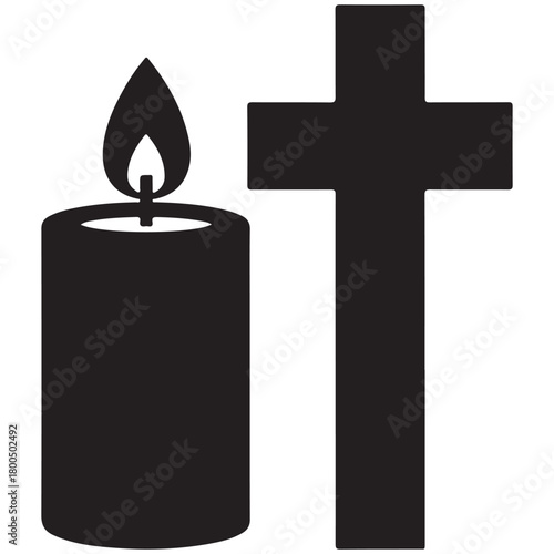 Silhouette of a lit candle and a christian cross