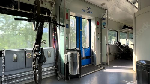 Transporting bicycle in train carriage. Bicycle is transported in passenger train. Space for bicycle in passenger train carriage. Carrying of Bicycles in Train Carriage. 