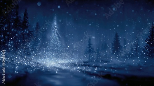 Winter scene with snow falling on trees and ground in blue tones.