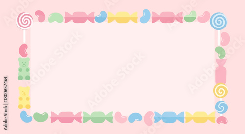 Delightful candy frame with lollipops, jelly beans, and gummy bears on pink backdrop