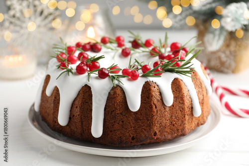Wallpaper Mural Tasty Christmas cake with icing, cranberries and rosemary on white wooden table, closeup Torontodigital.ca