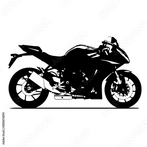 Silhouette of a sport motorcycle poised for speed.