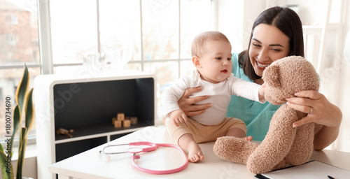 Female pediatrician with li...