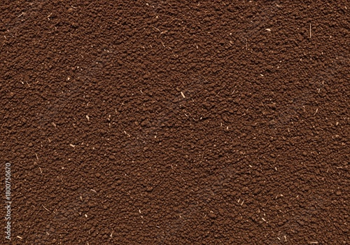 Seamless repeating texture of rich dark brown organic soil and finely sifted compost