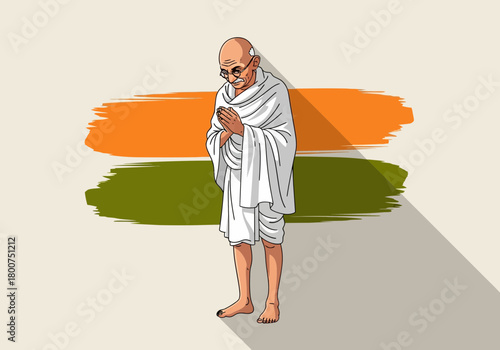 Mahatma Gandhi standing with folded hands wearing traditional Indian attire and glasses.