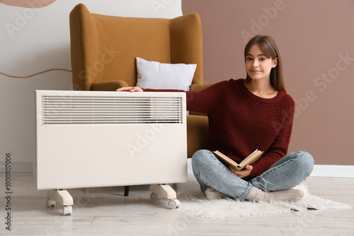 Young woman with electric c...