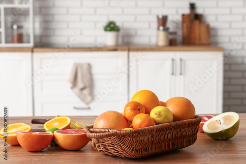 Fresh citrus fruits in wick...