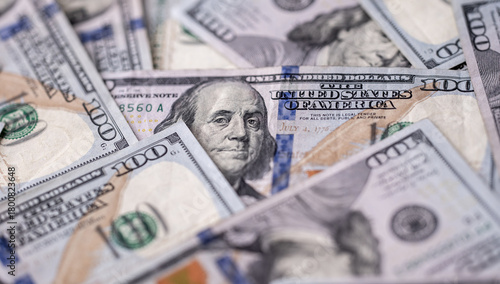 Money background with 100-dollar bills. Texture of US currency. 100 USD banknotes background. American hundred-dollar notes background. Pattern of US dollars for finance concept. Cash background.