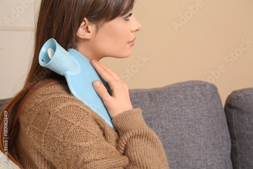 Young woman in sweater with...