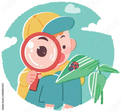 虫眼鏡でてんとう虫を観察する男の子