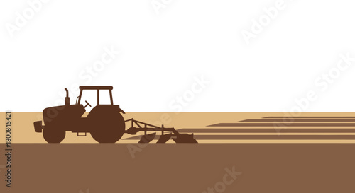 Silhouette of a tractor plowing a field during a sunny day illustrating agricultural work and cultivation