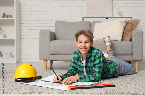 Teenage architect drawing h...