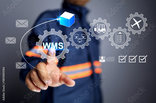 warehouse management system WMS concept with staff pointing on gear to manage transportation process