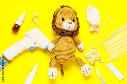 Toy lion with influenza tes...