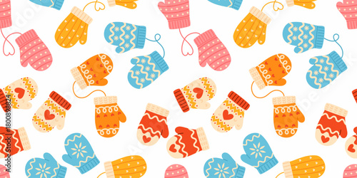 Seamless pattern with knitted winter mittens. Cozy patterned mittens.