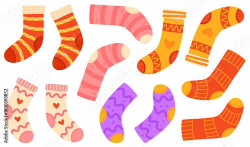 A set of warm knitted socks. Cozy socks with patterns.