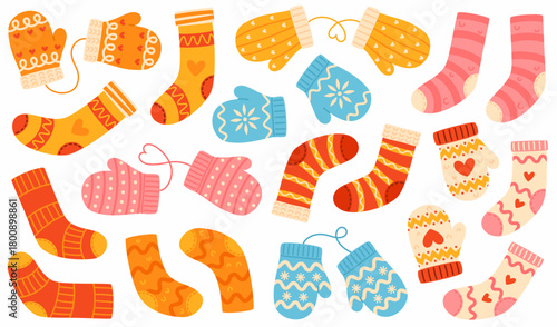 Set of knitted socks and mittens with patterns.