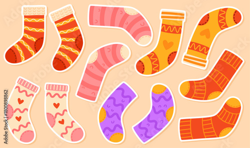 A set of warm knitted sock stickers. Cozy socks with patterns.