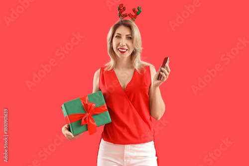 Smiling woman with reindeer...