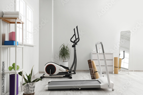 Interior of stylish gym wit...