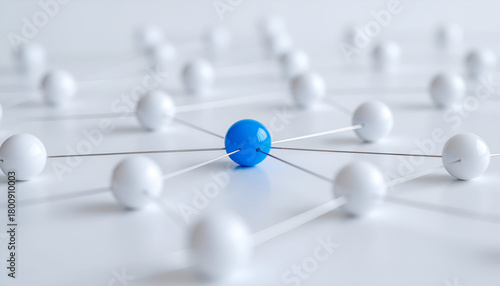 Abstract 3D composition of spheres linked by lines, highlighting a blue central point to represent connectivity, centralization, and digital structure.