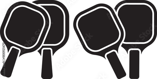 Four pickleball paddles silhouette