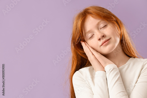 Sleeping girl on lilac back...