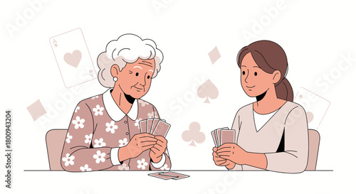 Family Bond: A Grandmother and Granddaughter Enjoying a Game of Cards Together